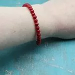 Красная нит - браслет из коралла
